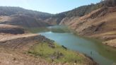 Unrecognizable before-and-after photos show ‘zombie lake’ rising from the grave after years of droughts: ‘It’s been a wild year’