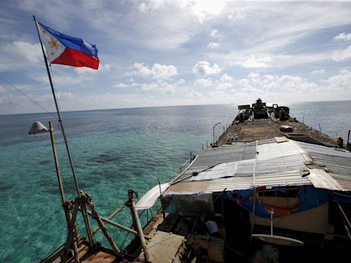 Philippines says it will still assert South China Sea rights after resupply deal with China