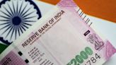 Indian rupee weakens after four days of gains on record trade deficit