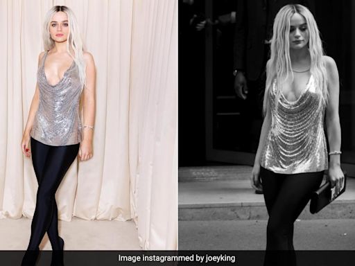 Joey King Gives The Early 2000s A Shoutout With A Silver Chainmail Top And Black Tights