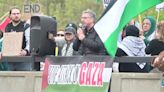 Pro-Palestine activists protest outside of House Speaker Johnson visit to Iowa City