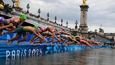 Rolling on the river: Olympic triathletes brave the currents of the Seine at last