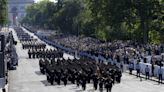 France's annual Bastille Day parade highlights Olympic flame relay, D-Day landings