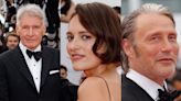 Harrison Ford, Phoebe Waller-Bridge, Mads Mikkelsen, and more dazzle at the Cannes world premiere of 'Indiana Jones and the Dial of Destiny.' Here are the 16 best photos.