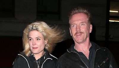 Damian Lewis looks edgy as he joins girlfriend Alison Mosshart at LFW