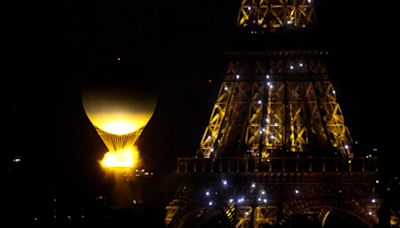 Opening Ceremony: Olympic flame rises over Paris as Céline Dion sings Edith Piaf