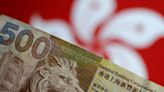 Improbable bets on break of Hong Kong dollar peg adding up