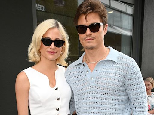 Pixie Lott and husband Oliver Cheshire look loved up at Wimbledon