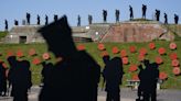 Giant silhouettes of D-Day fallen head to Normandy for 80th anniversary