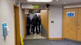 Photojournalist dragged from Tory party conference floor by security