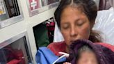 Bus full of migrants help mother give birth before being detained in Mexico