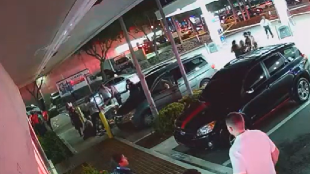 Surveillance video shows police help victim in North Miami Beach shooting