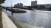 Tests show Paris' Seine River still has unsafe E. coli levels with Olympics less than a month away