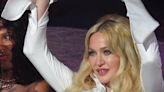 Madonna, 65, flashes her bra in saucy mini dress at drag festival