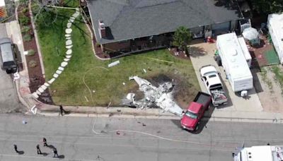 Plane crashes in front yard of Arvada home, neighbors pull victims out of wreckage