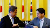 Japan, South Korea foreign ministers agree to improve ties