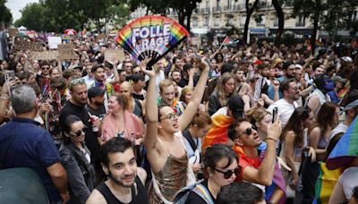 Tens of thousands rally against transphobia at Paris Pride March