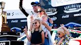 Scarlett Keselowski celebrates dad Brad's win, takes American flag to school