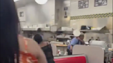 Wigs and plates fly at Waffle House brawl with influencer in middle