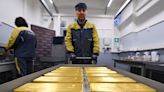 Gold hits 3-week high as U.S. dollar, bond yields fall