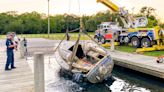 Mobile pulls sunken 28-foot sailboat from creek in federal program to remove derelict vessels