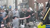 Police clash with far-right mob outside Southport mosque after knife killings