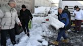 Winter welcome: Stranded drivers freed in Istanbul, Athens