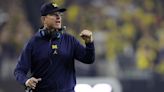 Chargers to hire ex-49ers coach Harbaugh after Michigan title run