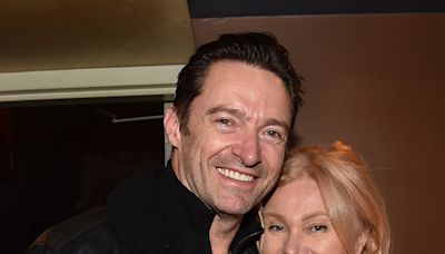 Deborra-Lee Furness glows in white for solo appearance at star-studded Louis Vuitton party