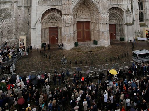 Fire in towering spire of medieval cathedral in French city of Rouen is under control