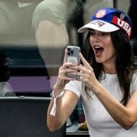 US model Kendall Jenner cheers from the sidelines at the Olympic women's gymnastics all-around final at the Bercy Arena in Paris