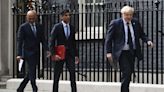 Two key U.K. Cabinet ministers quit Boris Johnson's government