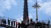 Notre Dame cathedral cross reinstalled in Paris amid restoration efforts