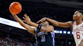 Photos: Arkansas upsets Duke in college basketball action