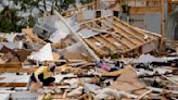 Storm-battered South is again under threat. A boy swept into a drain fights for his life