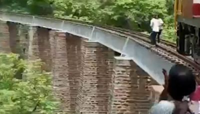 Husband and wife suffer serious injuries on bridge during photo shoot
