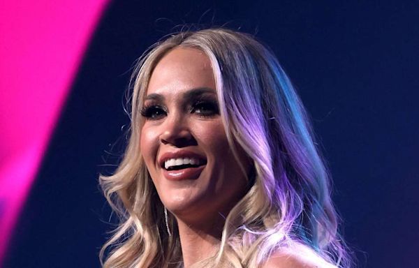 Carrie Underwood Puts Toned Legs on Display in 'Stunning' Concert Photos