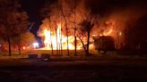 Raw Video: Barn erupts into flames