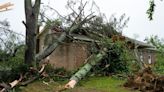 Storm-battered South is again under threat. A boy swept into a drain fights for his life