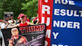 Hundreds of Trump supporters pack Bronx rally as protesters jeer outside