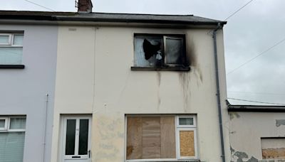 Overnight petrol bomb and suspected racist graffiti attacks in Larne could be linked