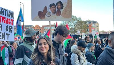 Police arrest 'coconut protesters' outside court appearance of woman charged over placard