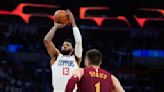 George scores 39 points and leads late revival as Clippers beat Cavaliers 120-118 for 50th win