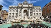 Climate activists dump charcoal in Rome’s Trevi Fountain
