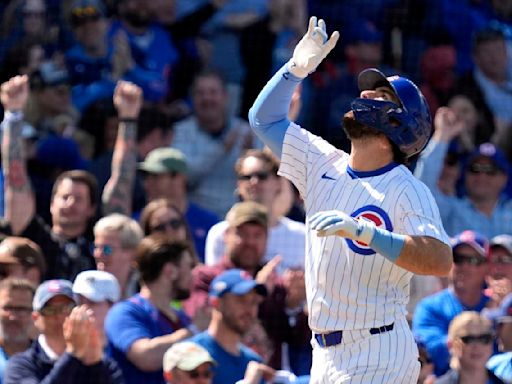 Cubs place SS Dansby Swanson on the injured list with a sprained right knee as OF Suzuki returns