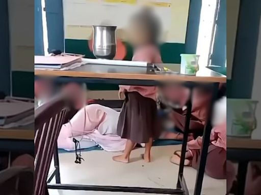 Viral VIDEO: Primary School Teacher Caught Sleeping Inside Class, Kids Fan Her Amid Scorching Heat In UP's Aligarh