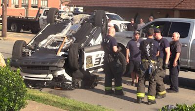 Police cruiser involved in roll-over crash in New Castle