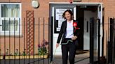 Dogs Rock Bows and Rosettes at Polling Stations on UK Election Day