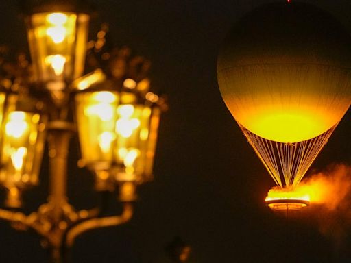 The Olympic cauldron will rise into Paris' skies every night. Here's why