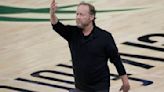 Mike Budenholzer is hired as coach of the Phoenix Suns, replacing Frank Vogel